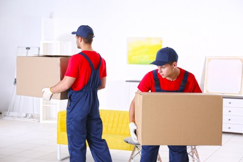 Office removals planning in Pinner with packed boxes and moving equipment