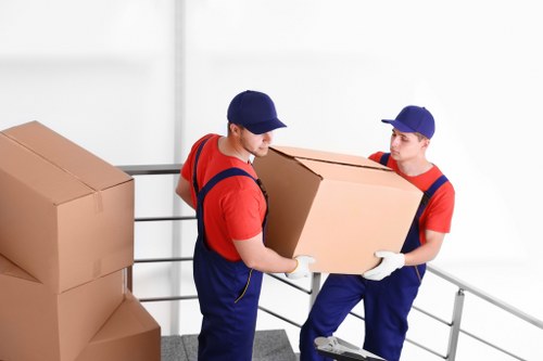 Office relocation planning in Pinner with moving boxes and workspace setup