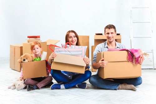 Business relocation logistics in Pinner with labeled boxes and desks