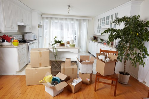 Trained moving staff handling furniture carefully