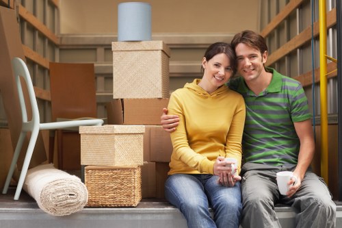 Local removal team handling furniture during house removals in Pinner