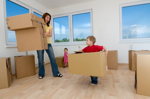 PPE and safe lifting practices during a man with a van job