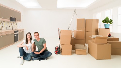 Packing and preparing items for a moving truck in Pinner