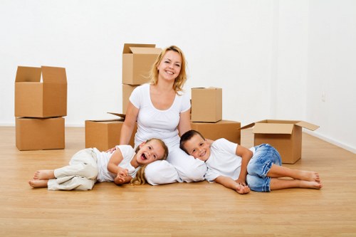 Professional moving team loading a removal van in Pinner